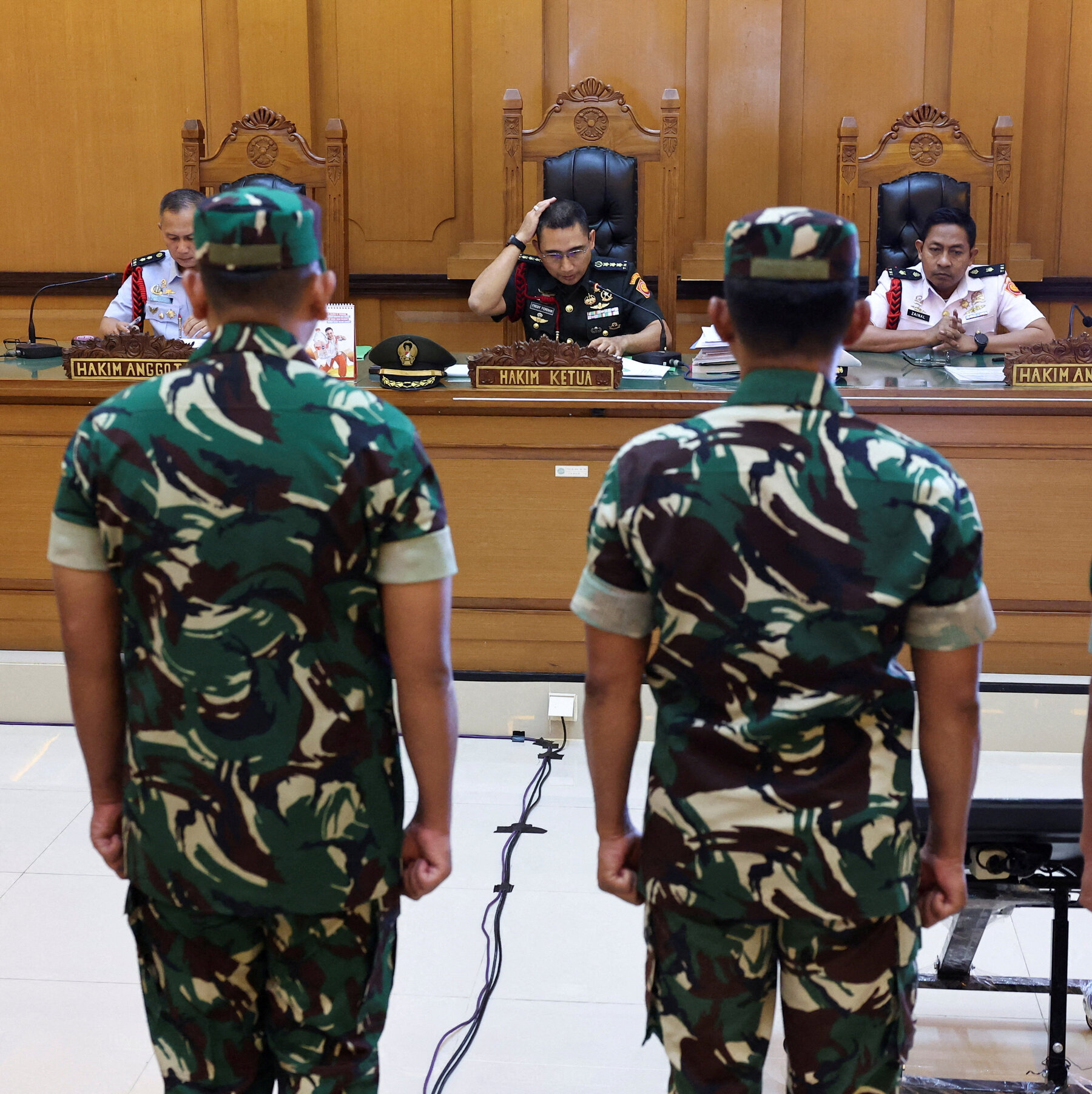 Indonesian military court convicts four over acid attack on outspoken rights advocate