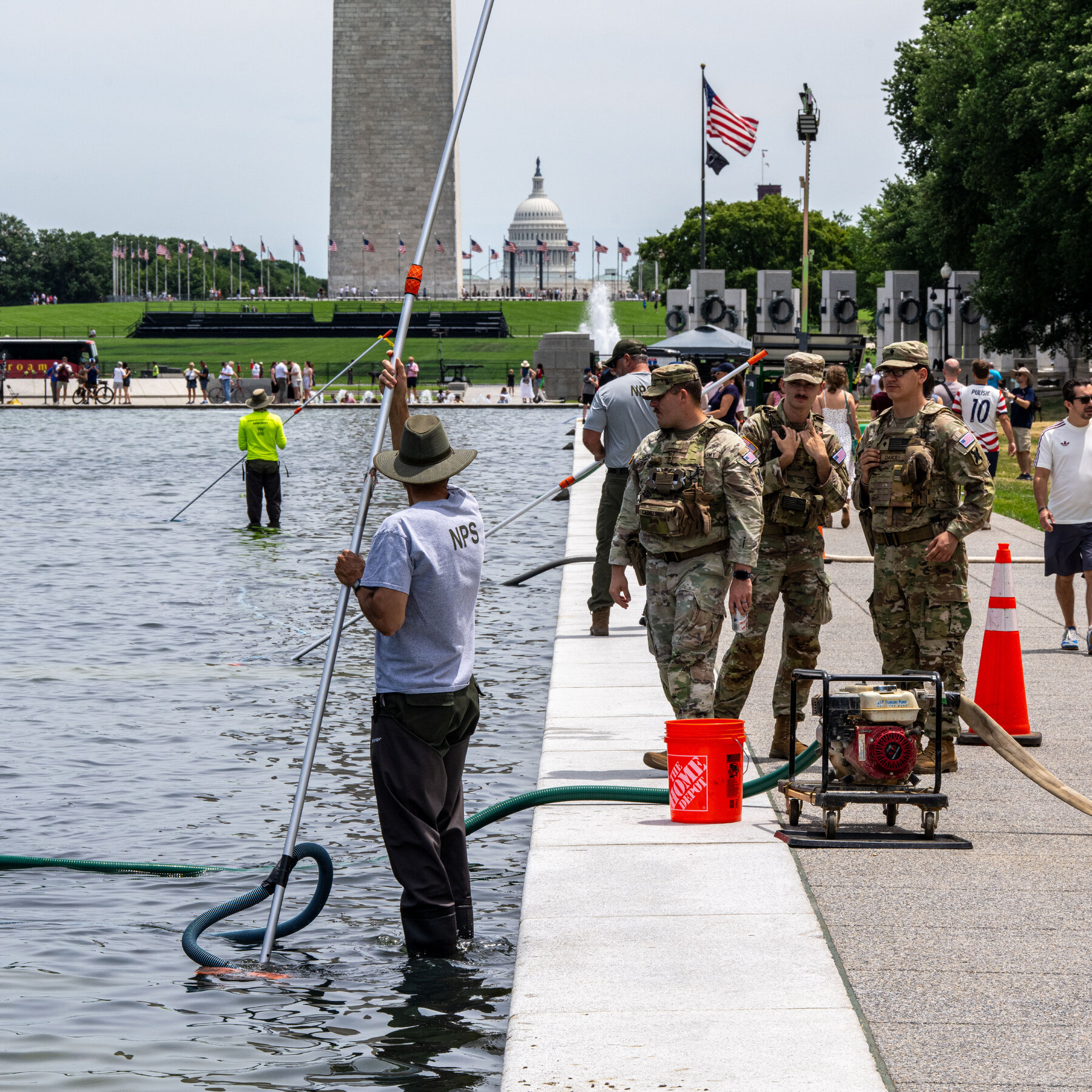 Reflecting Pool's 'American Flag Blue' Coating Peeling Amid Algae Removal Efforts