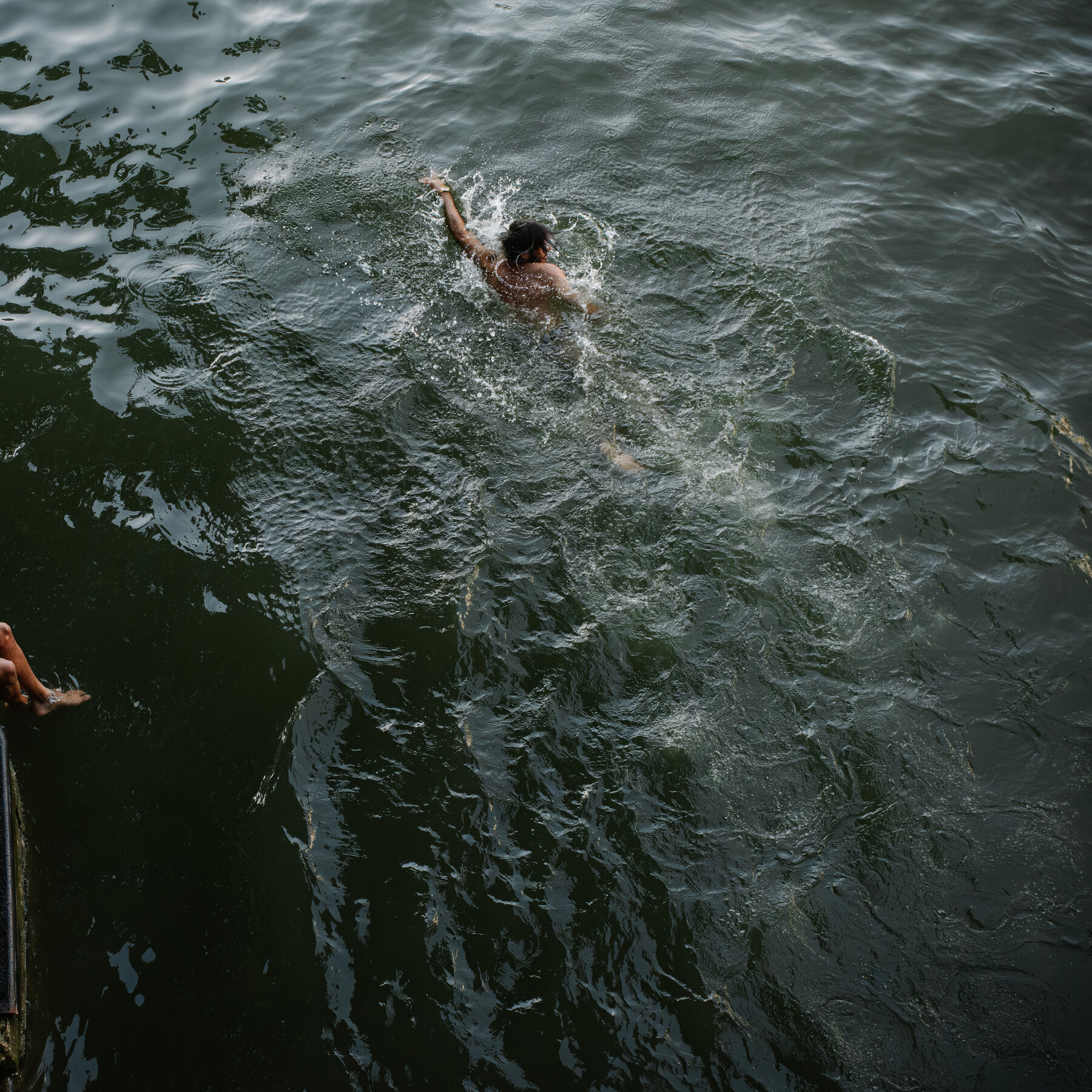 Parisians Flock to Canal Saint-Martin for Relief as Heat Tops 100°F; Drownings Reach 40 Nationwide