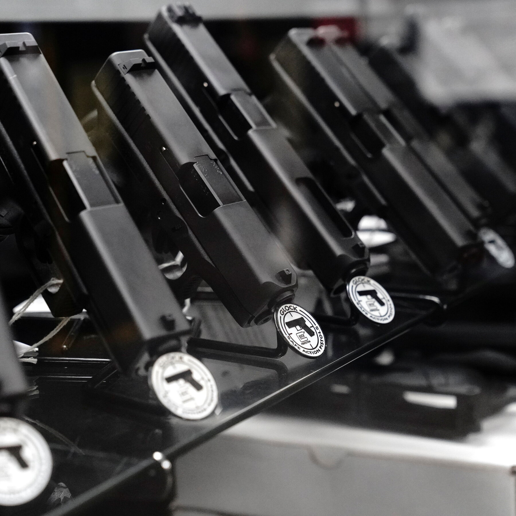Justice Department sues Virginia and California over assault‑weapon and Glock bans