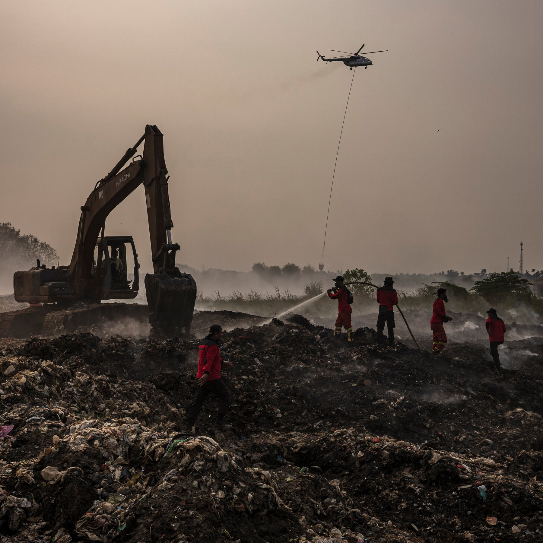 Indonesia landfill fire burns for over a week, toxic fumes sicken nearby residents