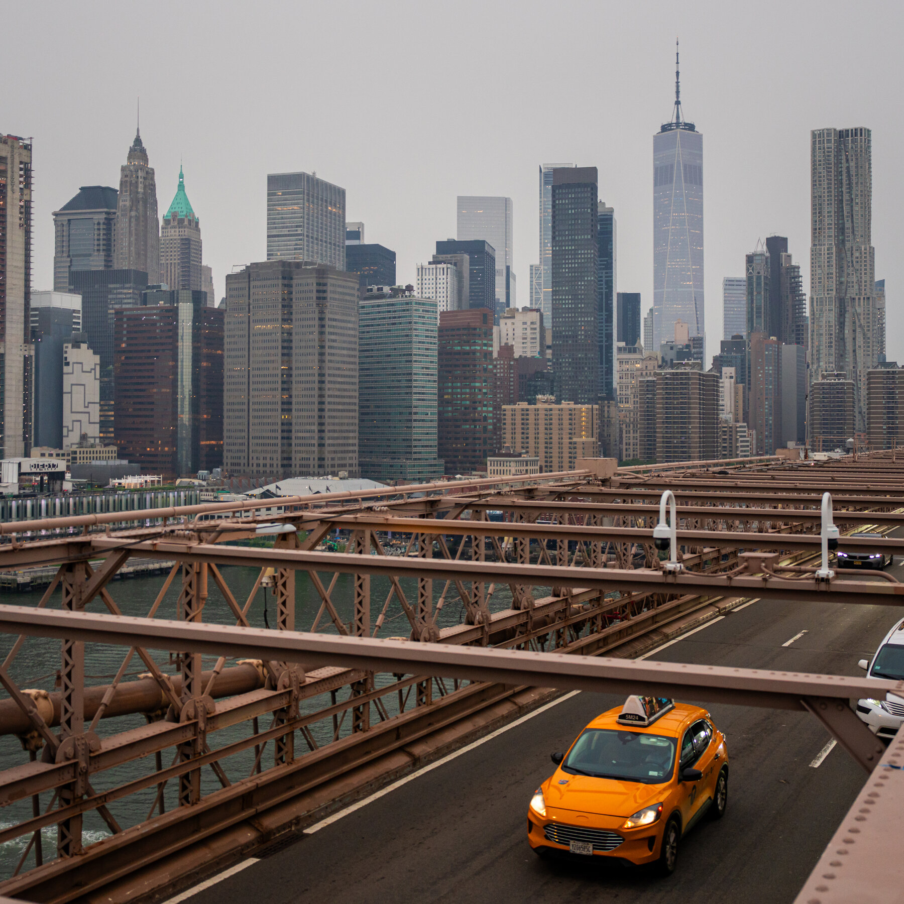 Hazardous Wildfire Smoke Blankets Cities, Obscuring Skylines and Lingering