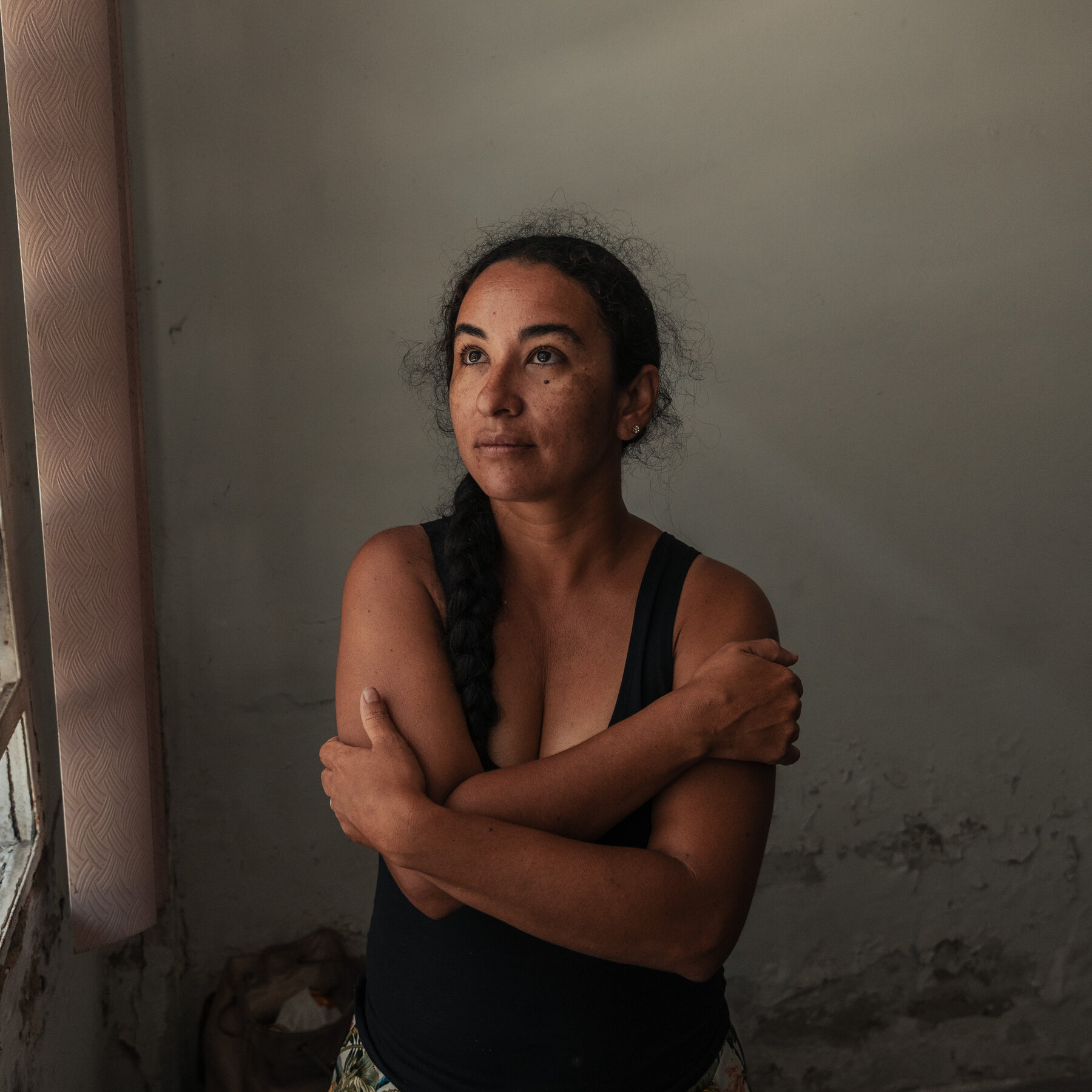 Venezuelan exiles spared by earthquake find grief deepened as they return home