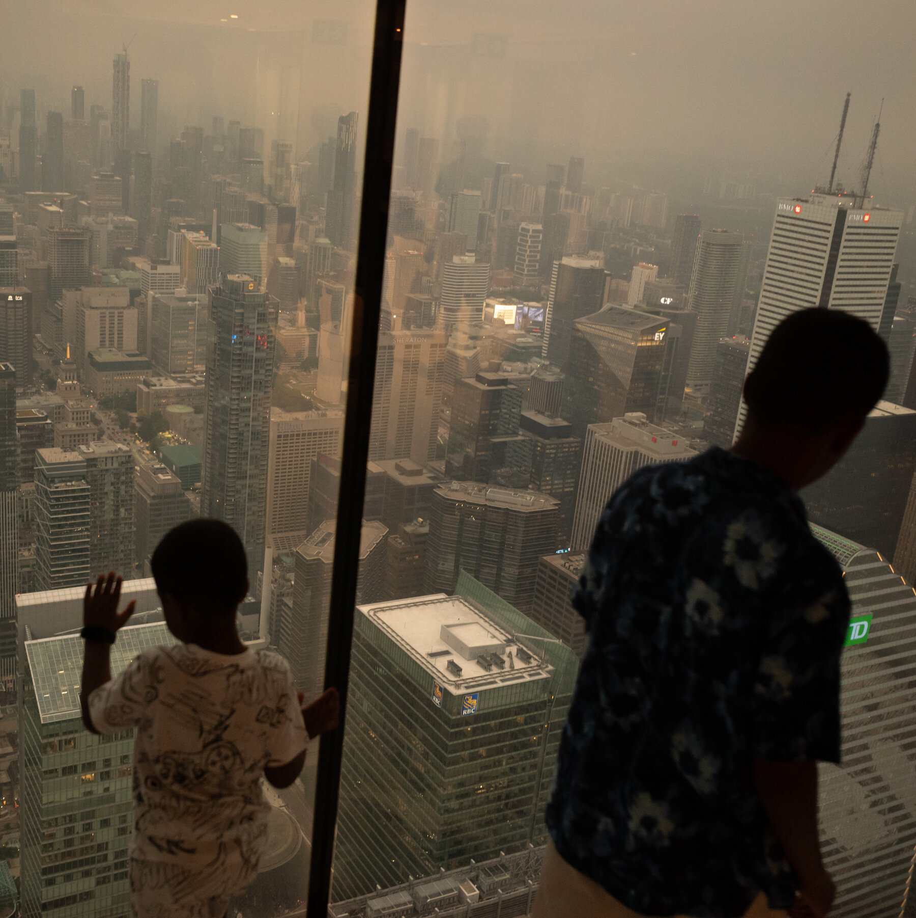Hundreds of Wildfires Blanket Large Parts of North America with Dense Smoke