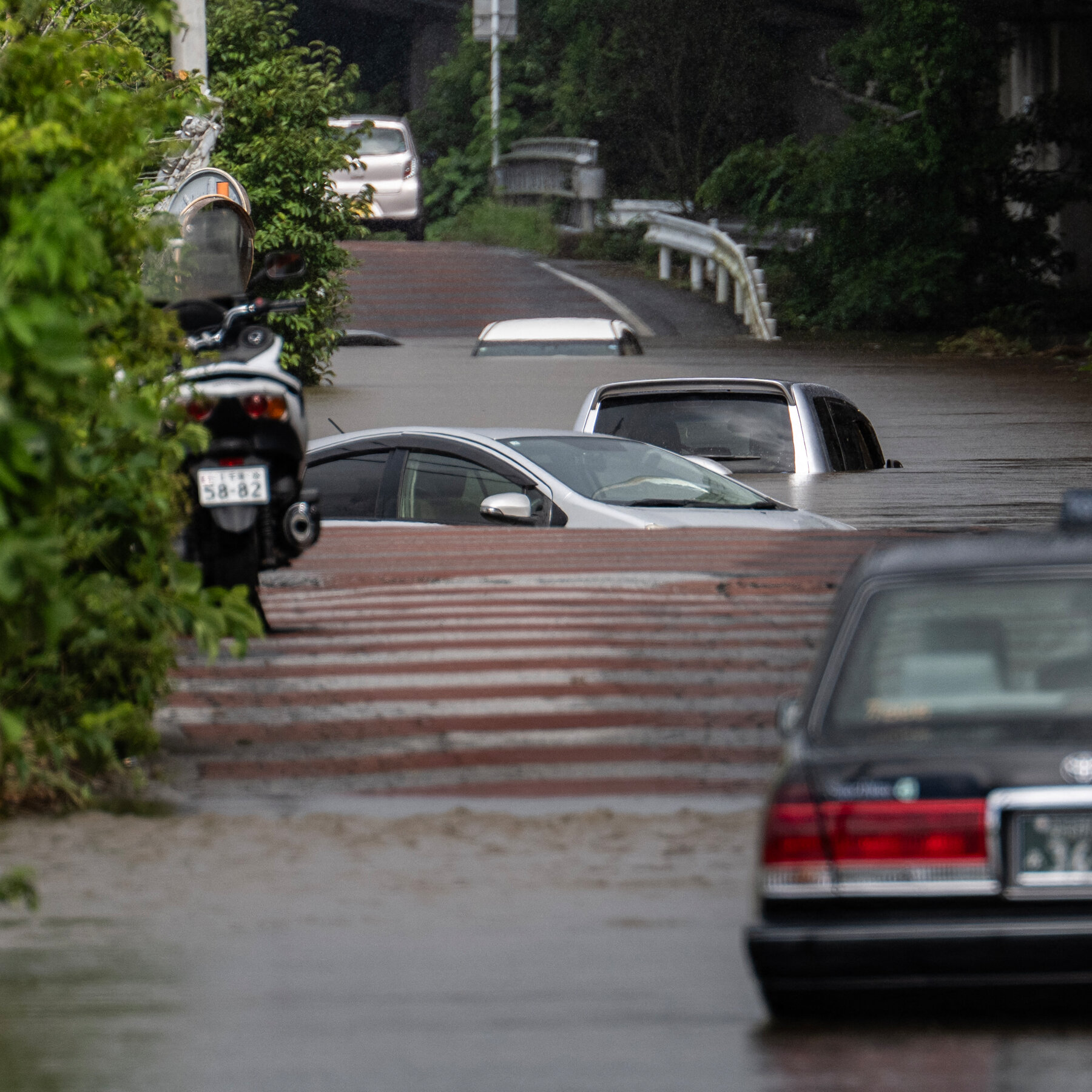 Record Rainfall in Japan Leaves Eight Dead and Thousands Stranded